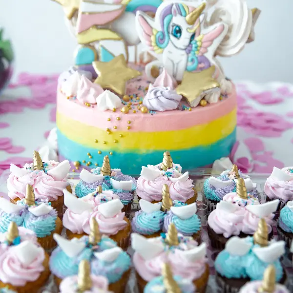 pink blue capcakes and rainbow unicorn cake with g 2022 03 05 07 18 39 utc